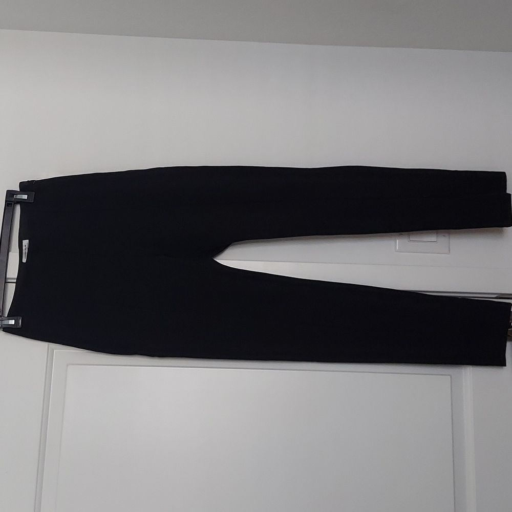 Black straight pants with ankle zippers
